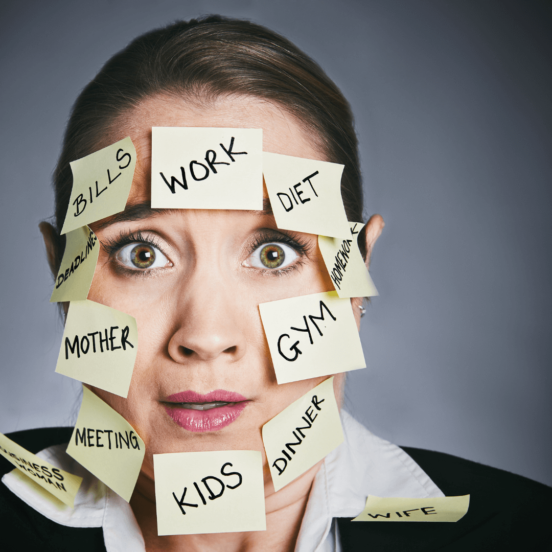 Woman with post it notes on face with all jobs listed on them