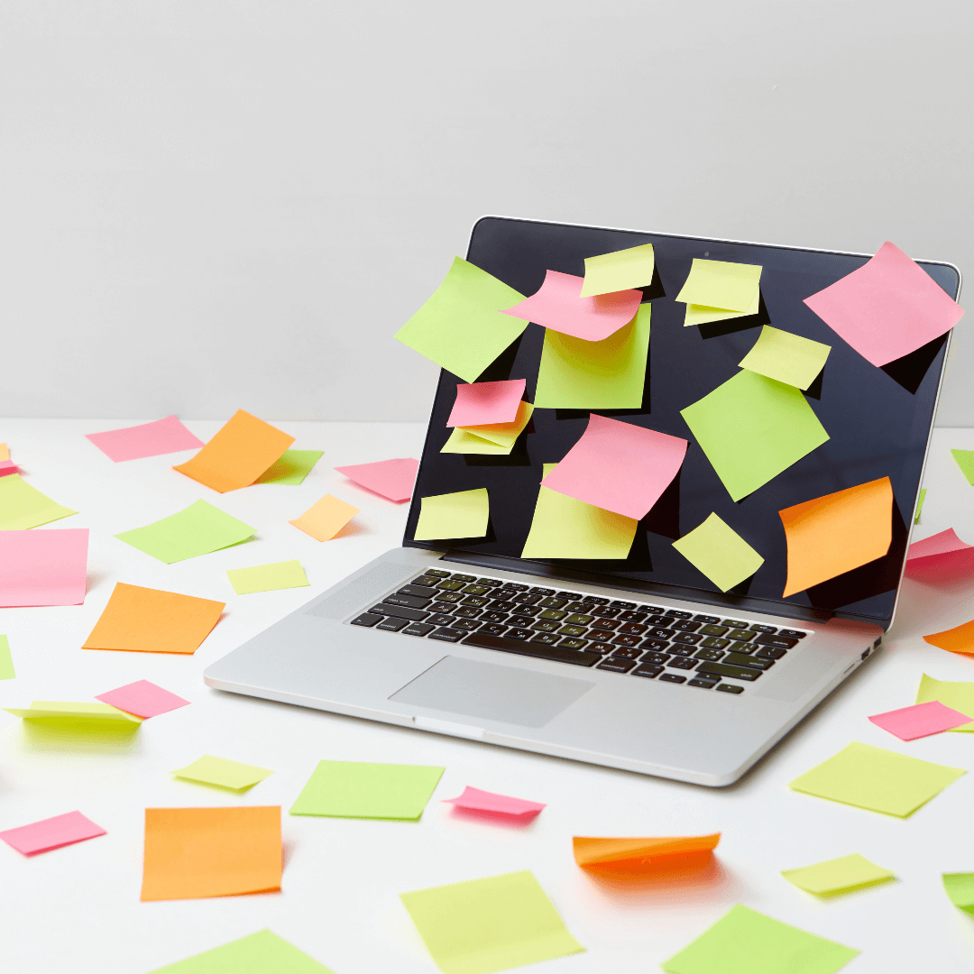Post it notes all over lap top