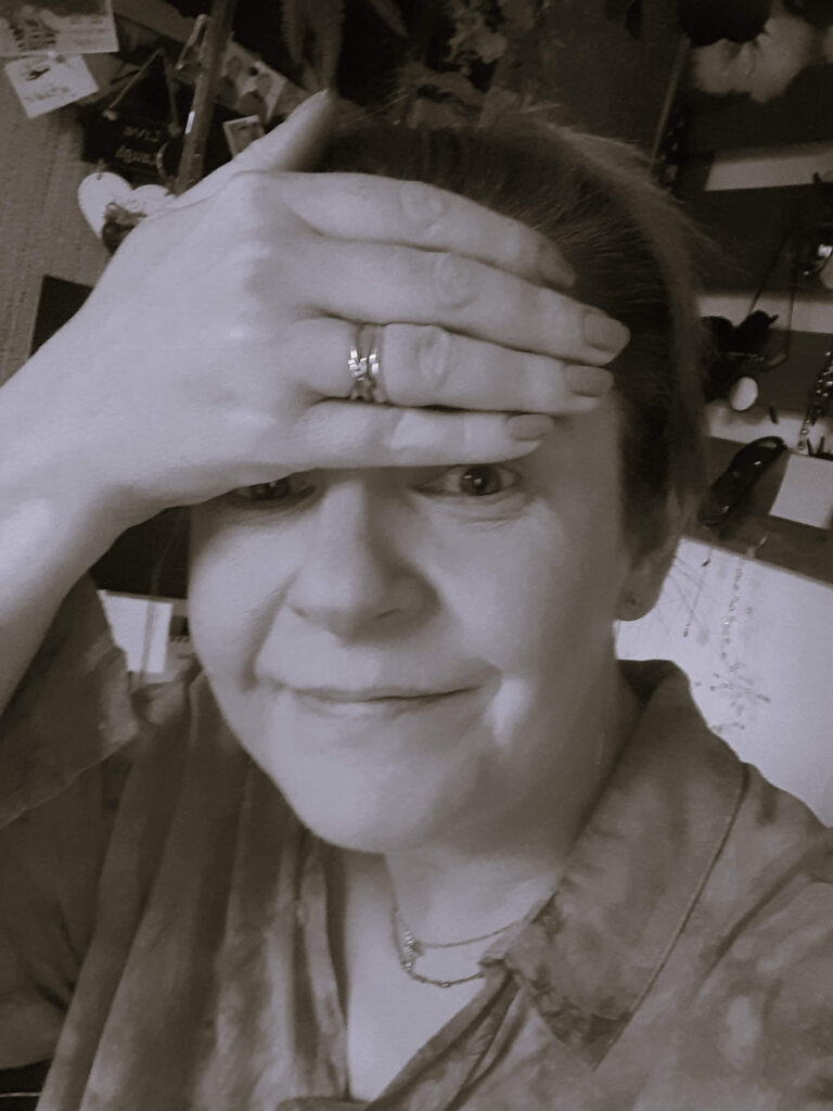Helen holding her head in Swadlincote