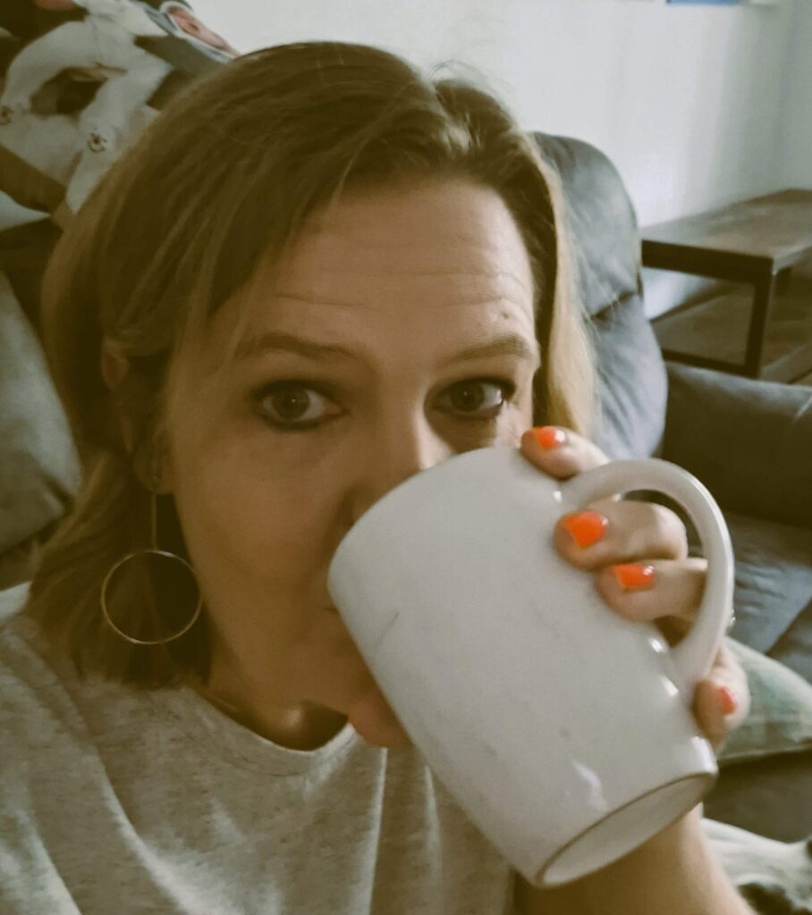 Addicted to Admin drinking coffee, ready to chat.