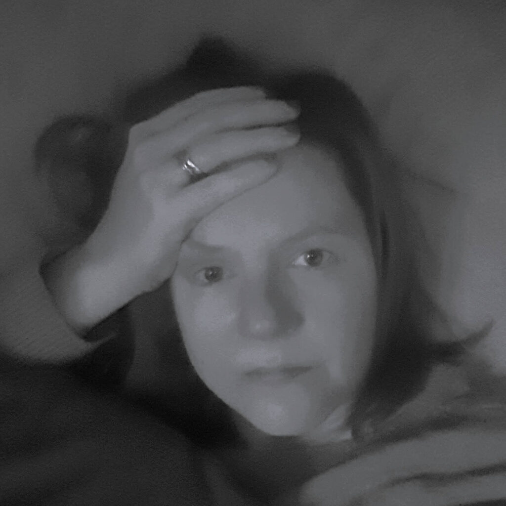 Addicted to admin holder her head, overwhelmed and anxious by her bookkeeping
