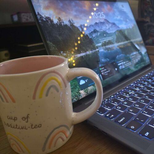 Cup of tea beside a laptop during an Addicted to Admin working day