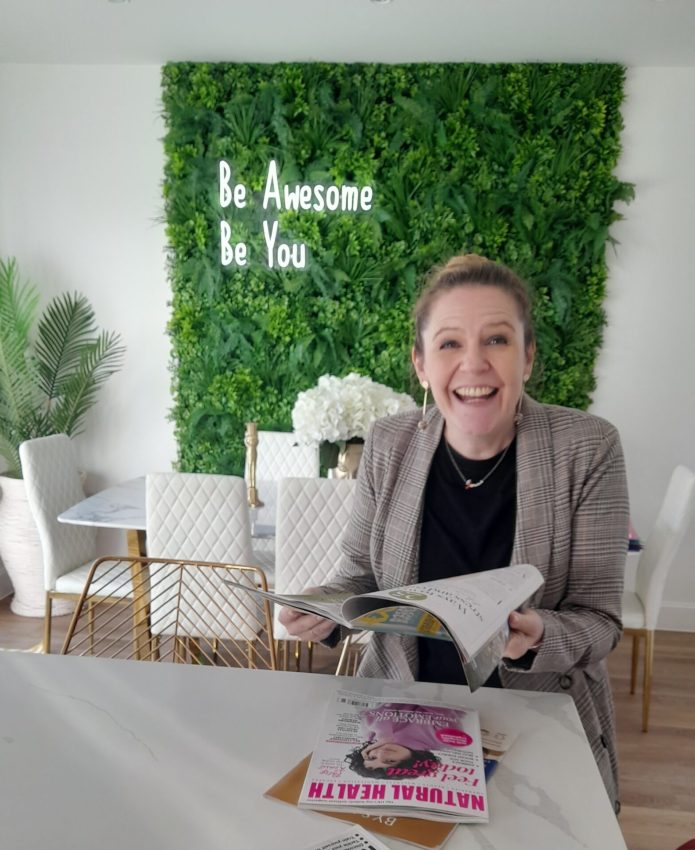 Be awesome Be You sign with Helen sat in front of it